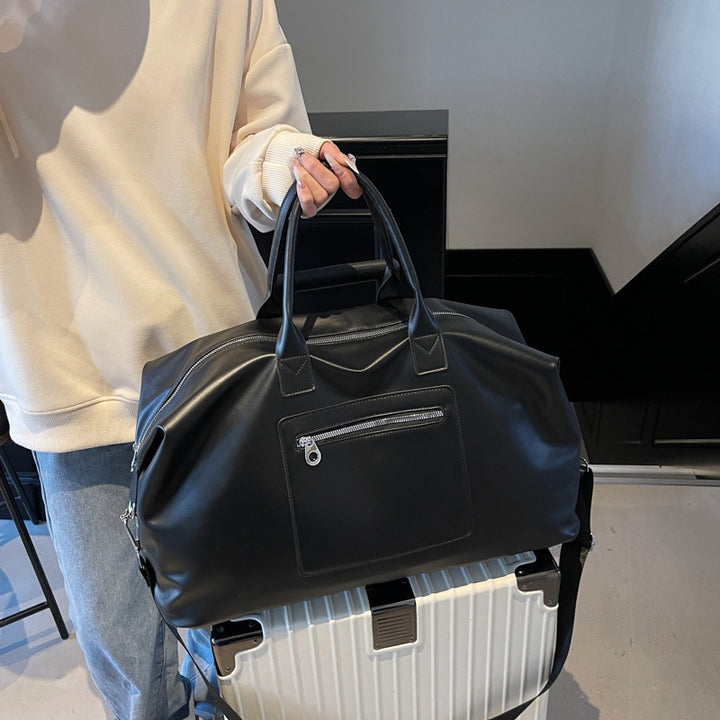 Stylish travel bag with robust design and adjustable shoulder strap Bowlift