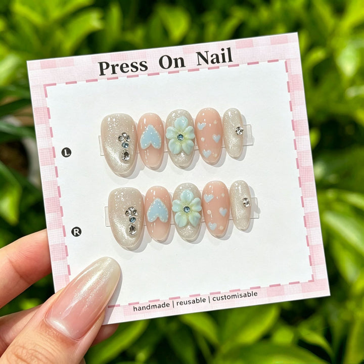 Artistic Press-On Nail Art Set with Cute Character and Bow Accents