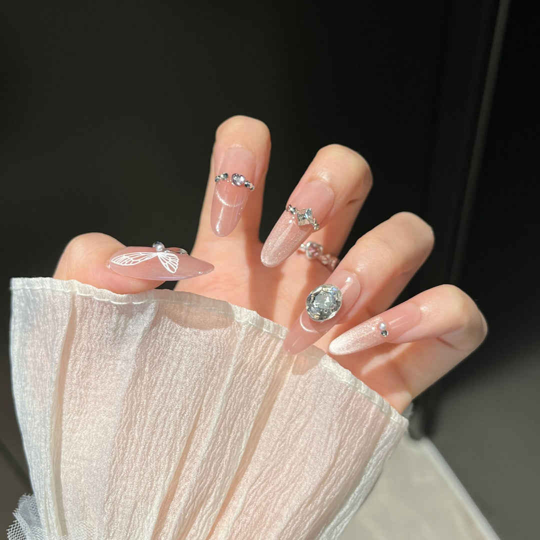 Elegant Nail Art Extensions with Pearl Accents Bowlift