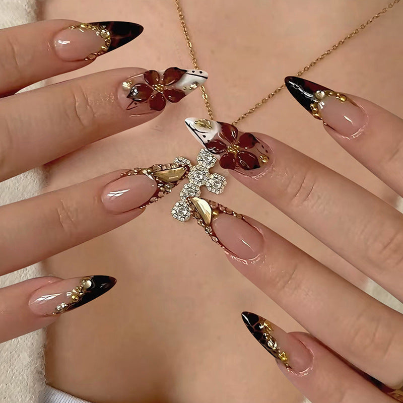 Acrylic nail set with elegant flower and glitter accent Bowlift