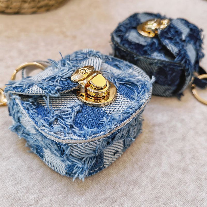 Distressed denim micro crossbody mini purse with gold turn-lock top handle Bowlift