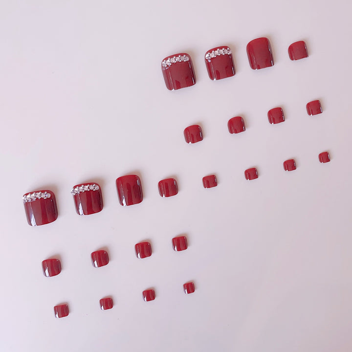 Acrylic nail set with elegant nail art and sparkle elements Bowlift