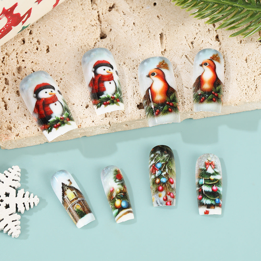 Creative artificial nails in festive Christmas design Bowlift