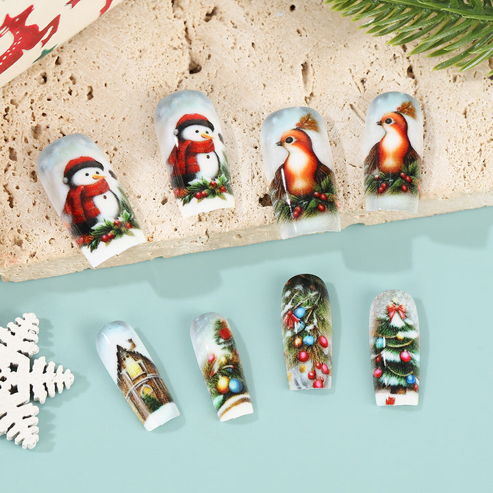 Creative artificial nails in festive Christmas design Bowlift