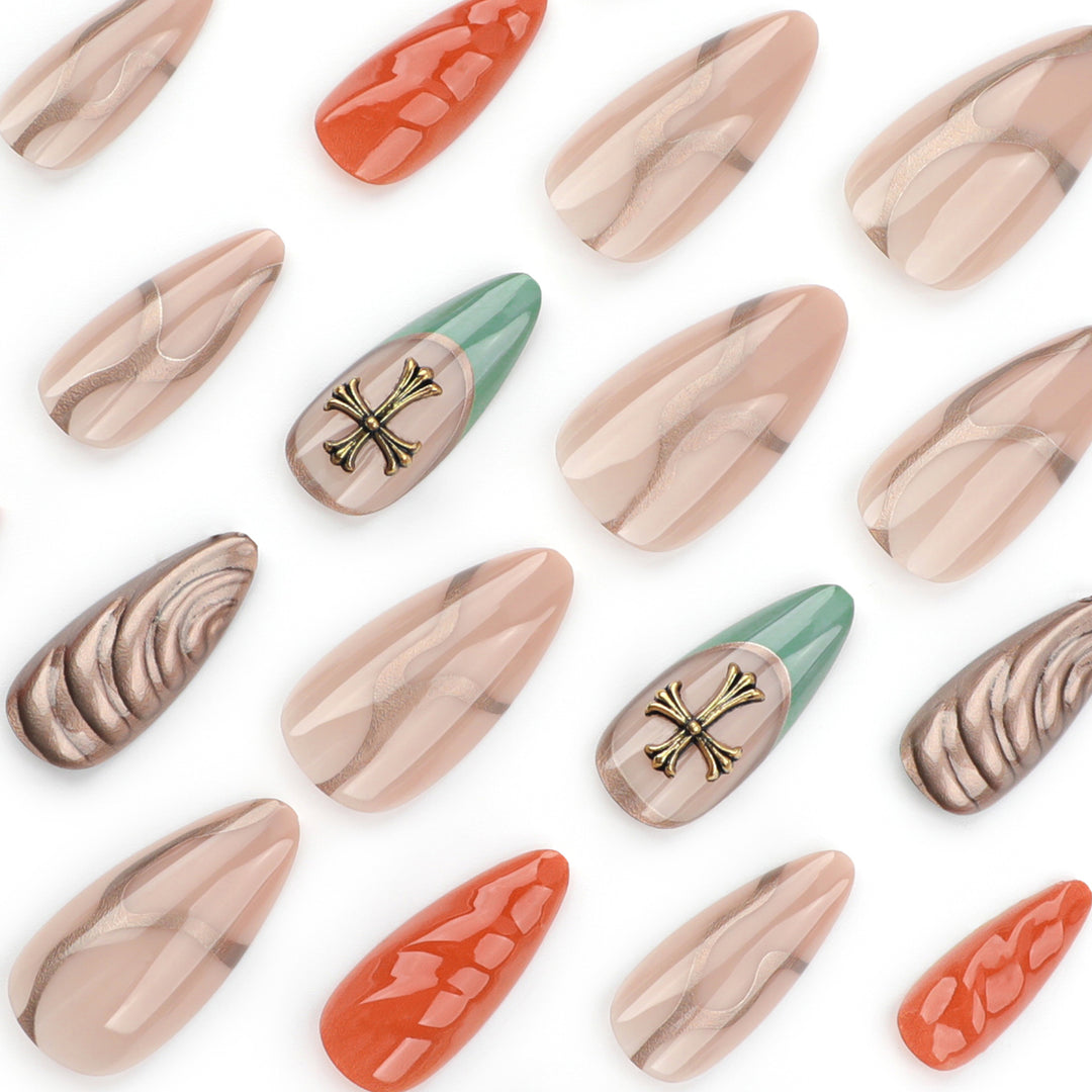 Artful stiletto nails with glitter and motif decorations Bowlift