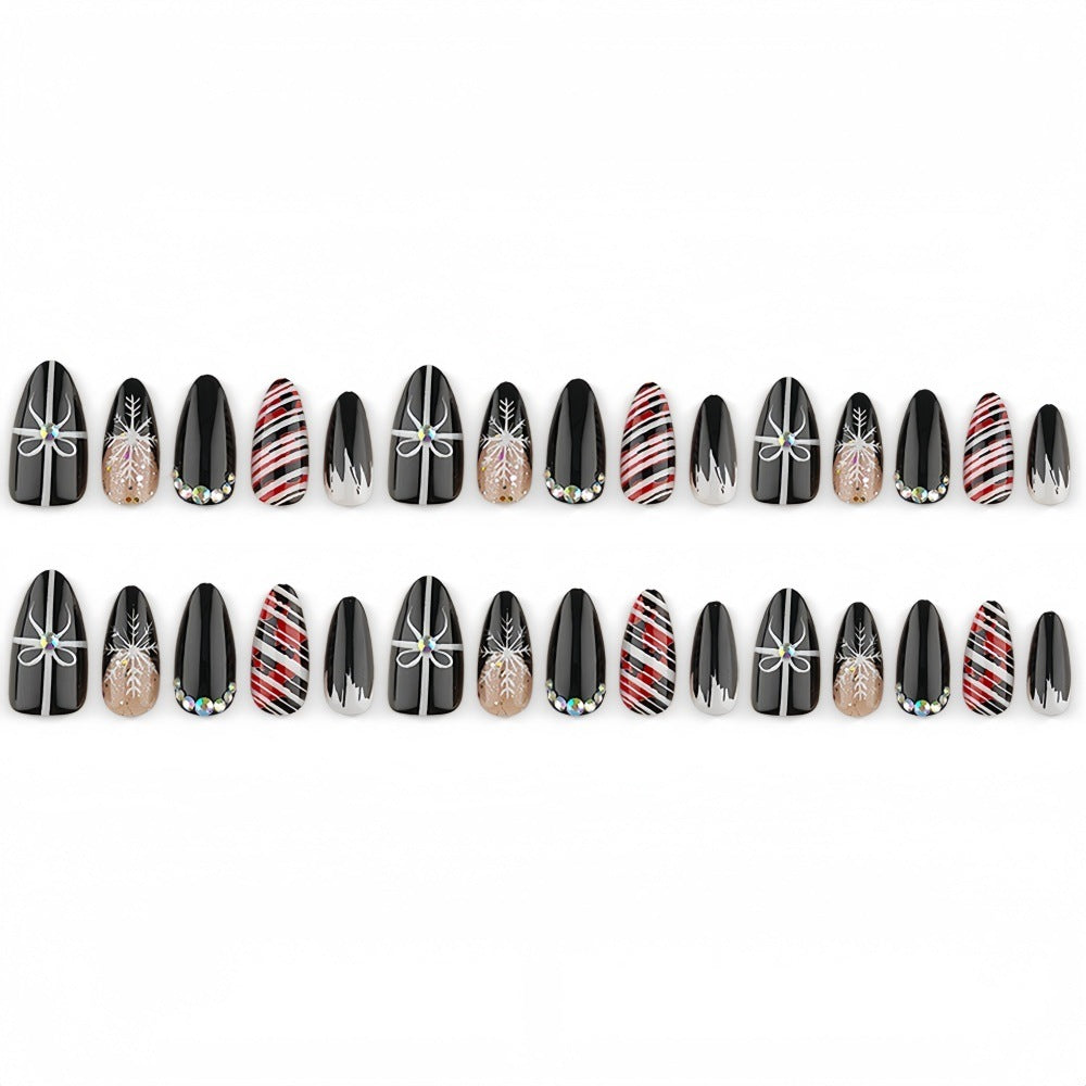 Artificial nail set with festive design and glitter accents Bowlift
