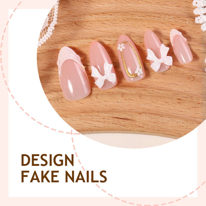 Artificial nail set with playful bow accents and delicate embellishments Bowlift