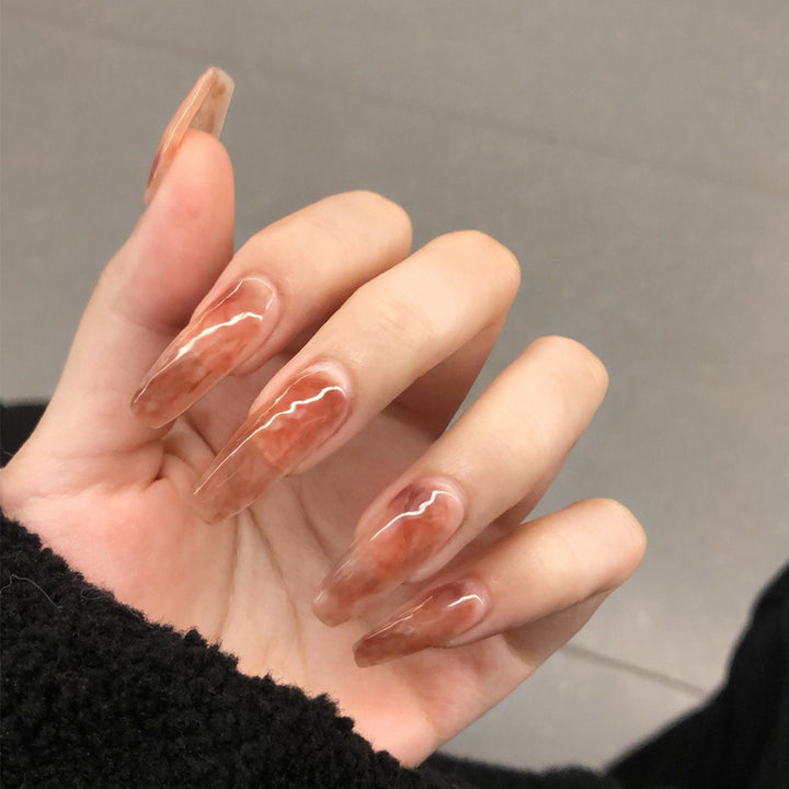 Artistic stiletto nails with elegant design Bowlift