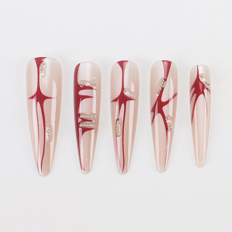 Artistic Stiletto Press-On Nails with Unique Abstract Design Bowlift