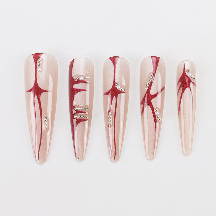 Artistic Stiletto Press-On Nails with Unique Abstract Design Bowlift