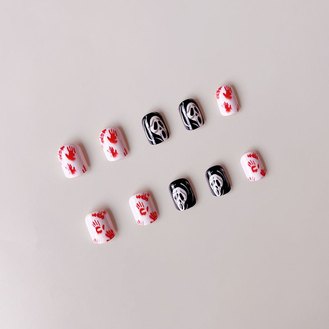 Creative Halloween Nail Art Set with Creepy Designs and Sparkling Accents Bowlift