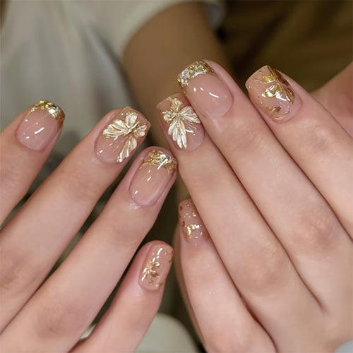 Artful nail design with leaf motifs Bowlift