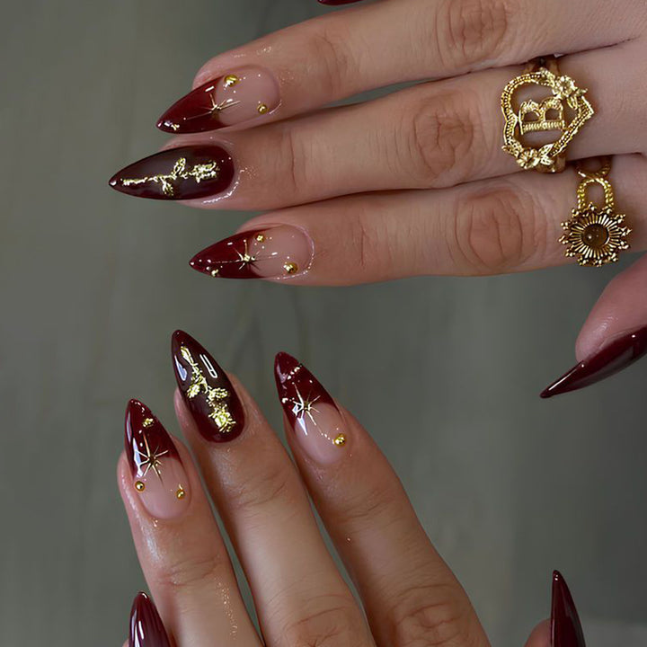 Stiletto Nail Art Extensions with Gold Accents Bowlift