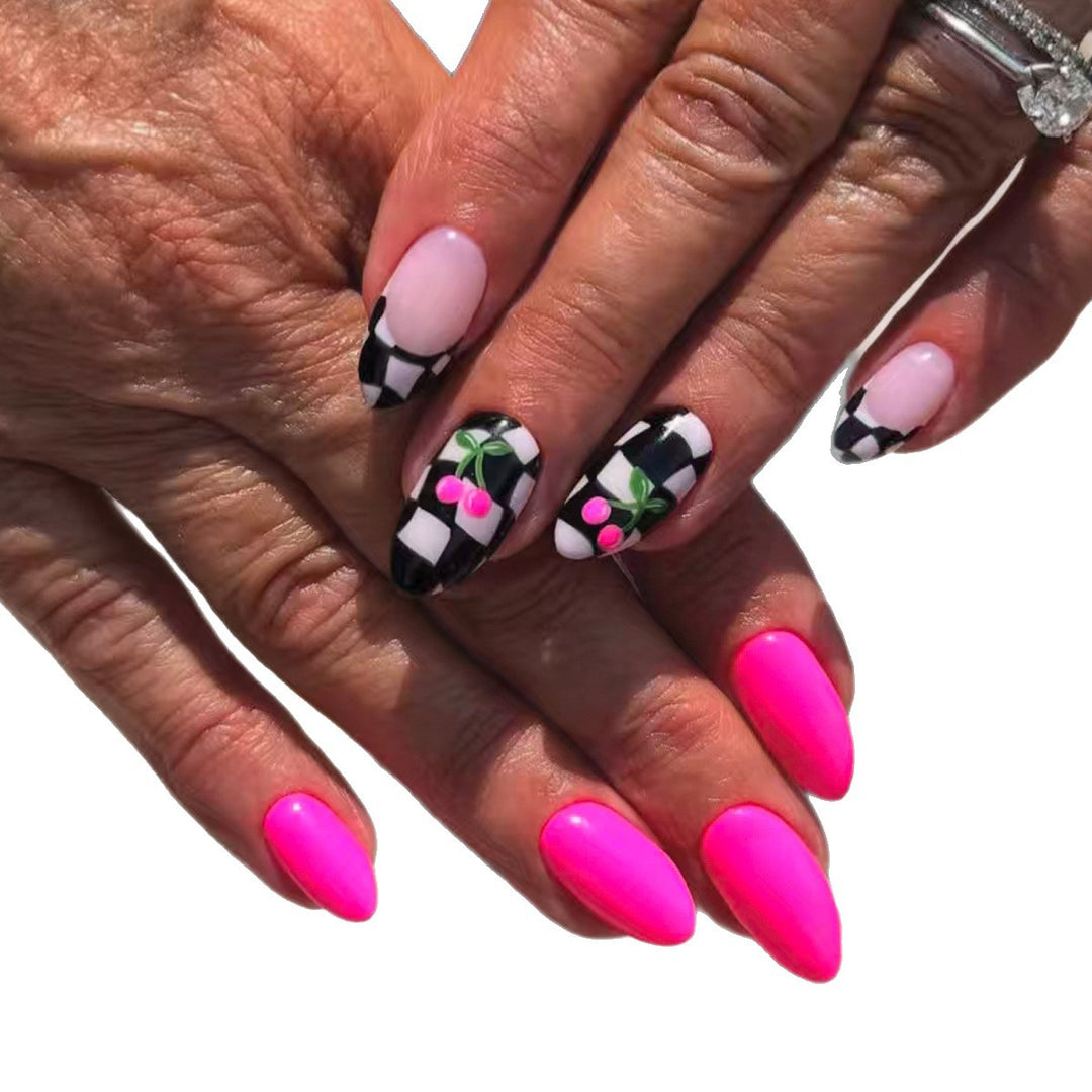 Creative artificial nails with playful cherry and checkerboard design Bowlift