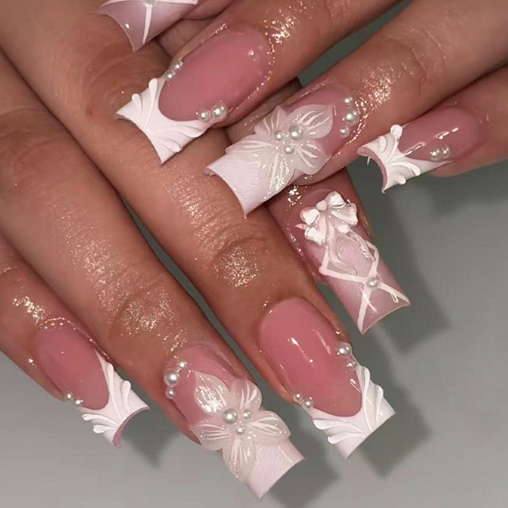 Elegant Press-On Nail Collection with Floral Accents Bowlift