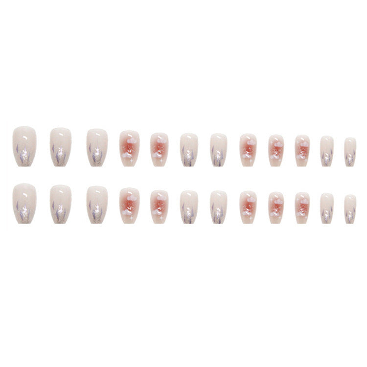Artificial nail set with floral design and glitter accents Bowlift