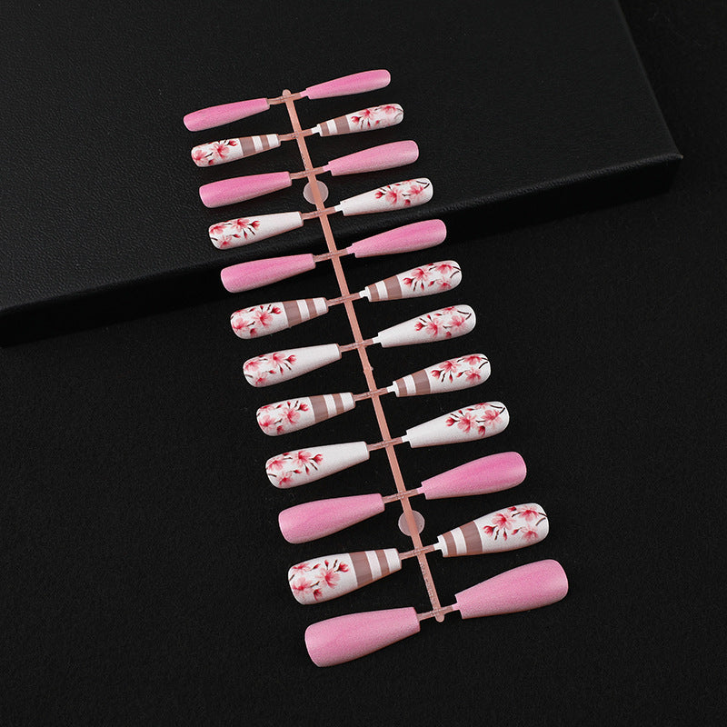 Artificial nails with floral embellishments Bowlift