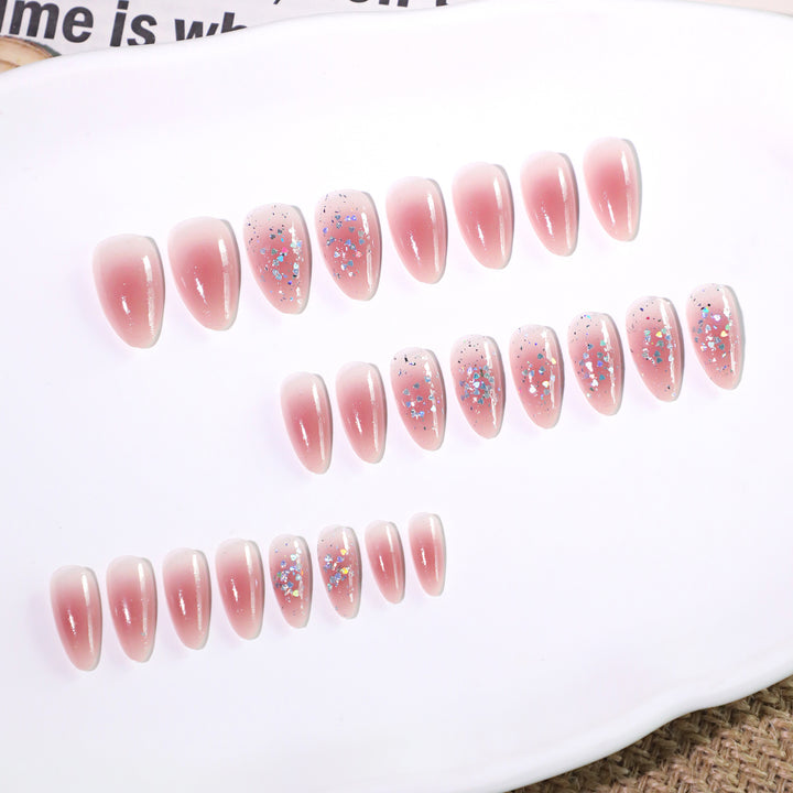 Glittering nail extensions with elegant V-design Bowlift