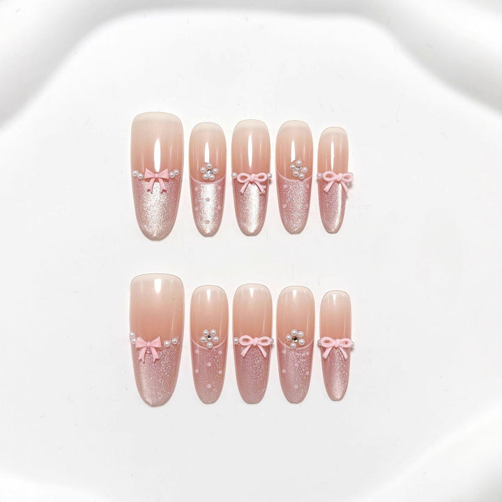 Elegant artificial nails with bows and pearl decoration Bowlift