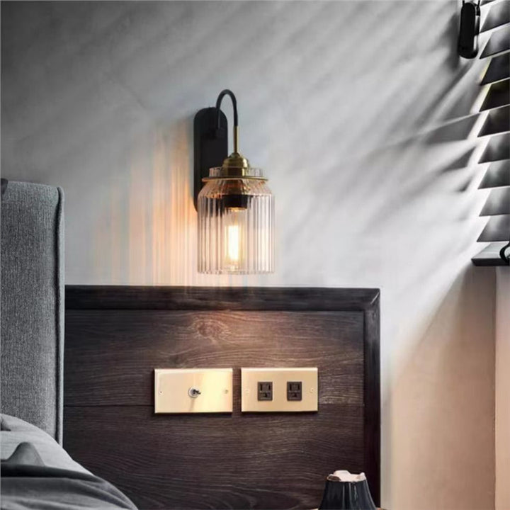 Ribbed Glass Wall Sconce with Curved Arm and Edison Bulb Compatibility Bowlift