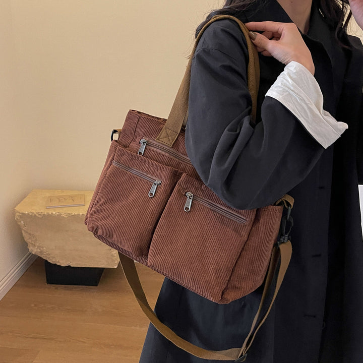 Durable shoulder bag with multiple compartments Bowlift