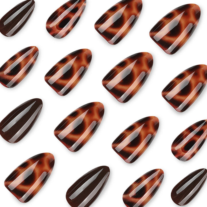 Artful stiletto nails with elegant leopard pattern Bowlift