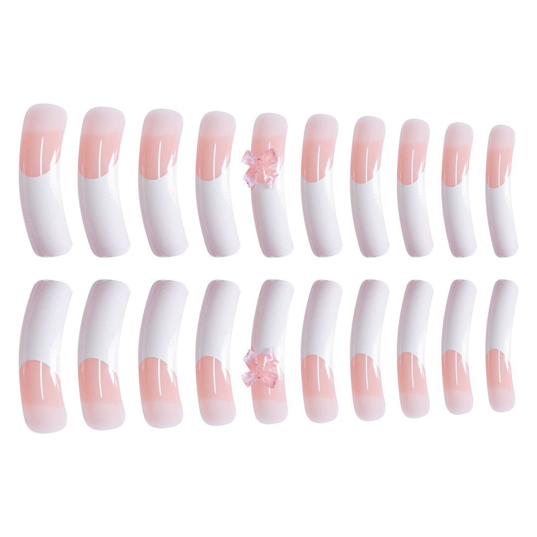 Elegant Nail Art Enhancements with Decorative Bow Accents Bowlift