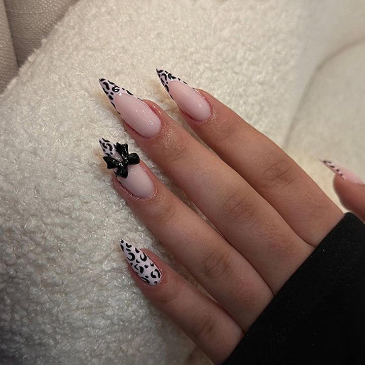Artful Stiletto Nails with Leopard Print and Bow Accent Bowlift