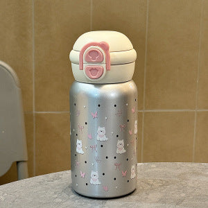 Women's insulated drinking bottle with secure pressure closure and playful animal design Bowlift