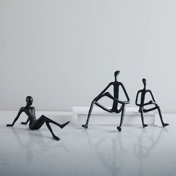 Artistic Sitting Figure Sculpture