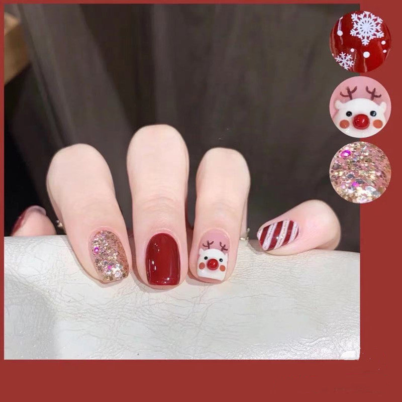 Artificial nail design with festive Christmas motif Bowlift