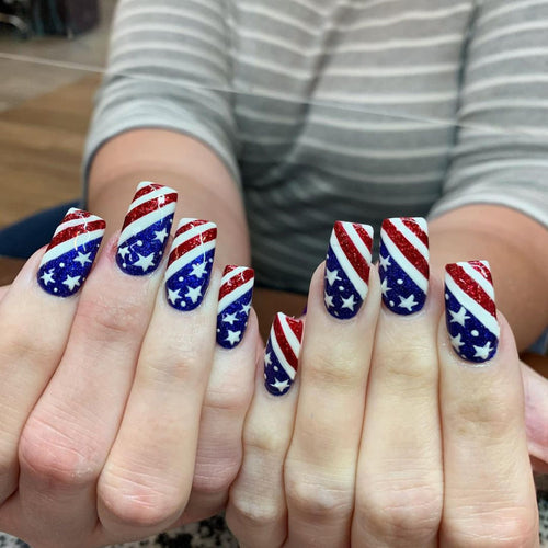 Artificial nails in patriotic stars and stripes design Bowlift