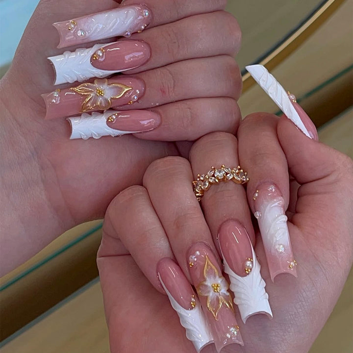 Artificial nails with handcrafted floral accents Bowlift