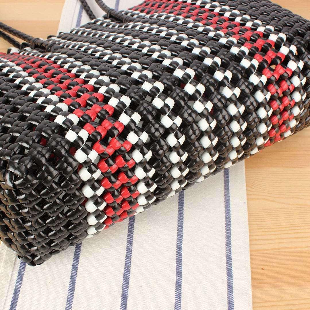 Tote bag made of sturdy woven material with stylish colored accents Bowlift
