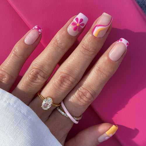 Creative Nail Art with Floral Design and Colorful Accents Bowlift