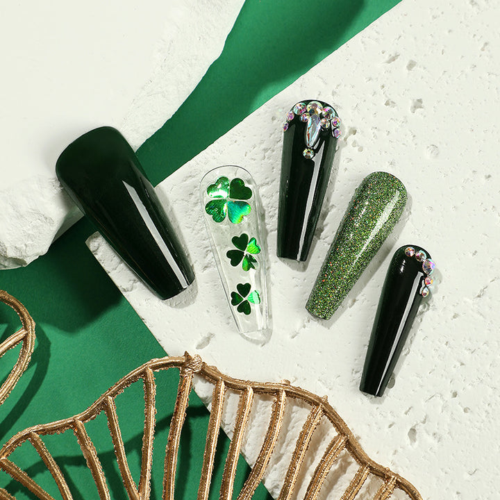 Artificial nail art with clover leaf motifs Bowlift