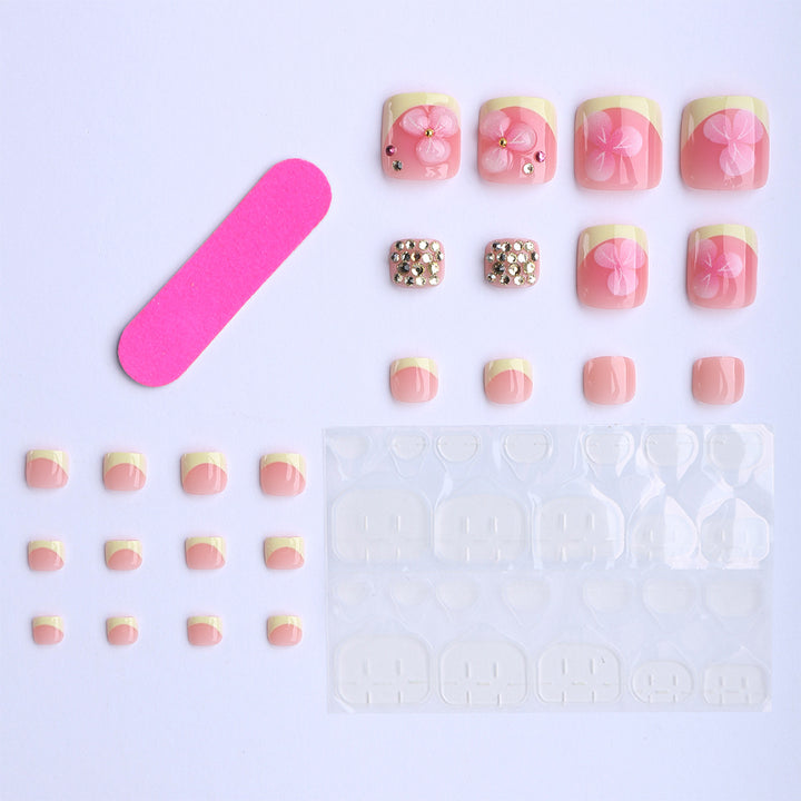 Artificial nail extensions with flower design and glitter accents Bowlift