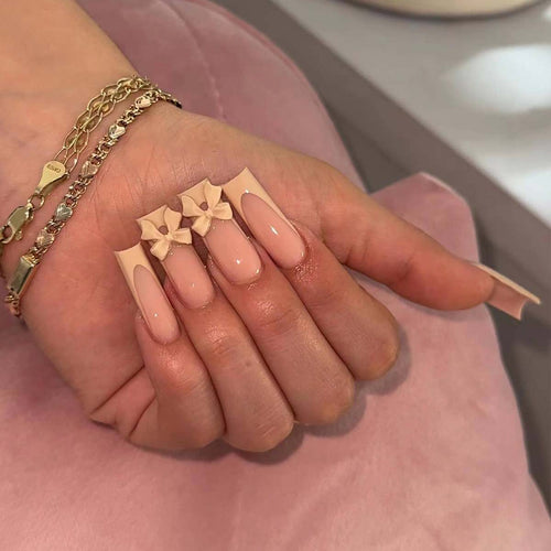 Artistic acrylic nails with bow decorations Bowlift
