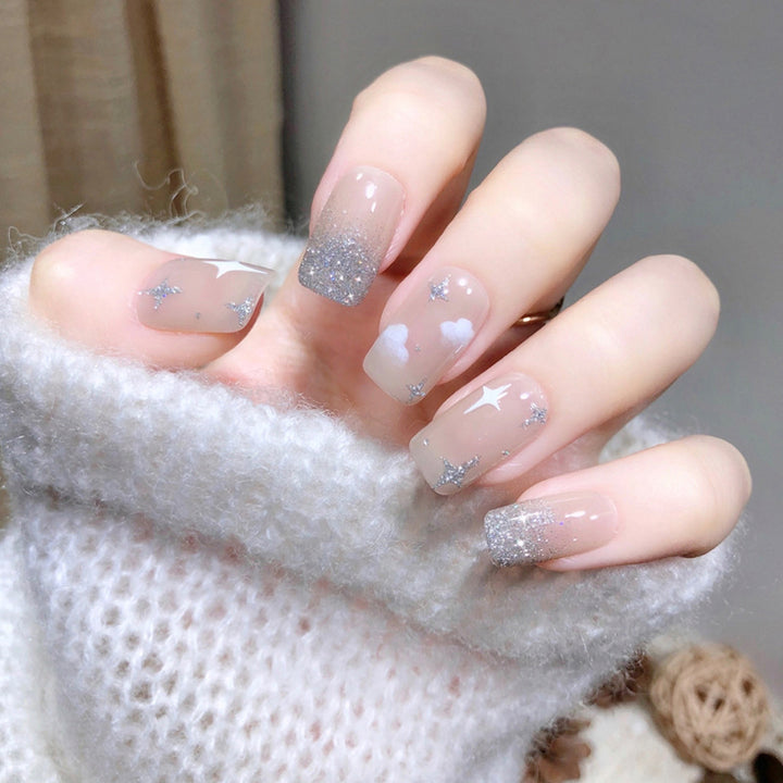 Glittering nail extensions with creative jewelry design Bowlift