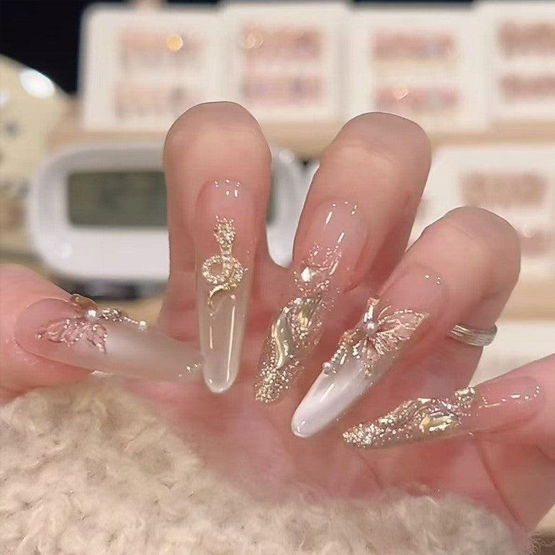 Artistic Nail Extensions with Decorative Elements Bowlift