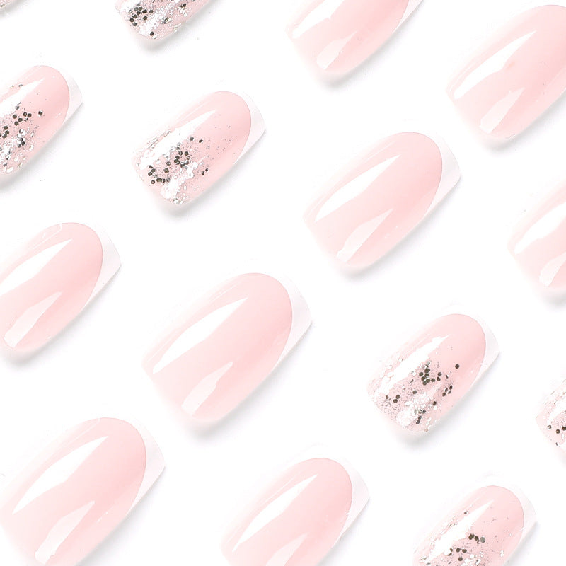 Artistic Nail Extensions with Glitter and French Tips Bowlift
