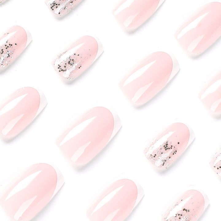 Artistic Nail Extensions with Glitter and French Tips Bowlift