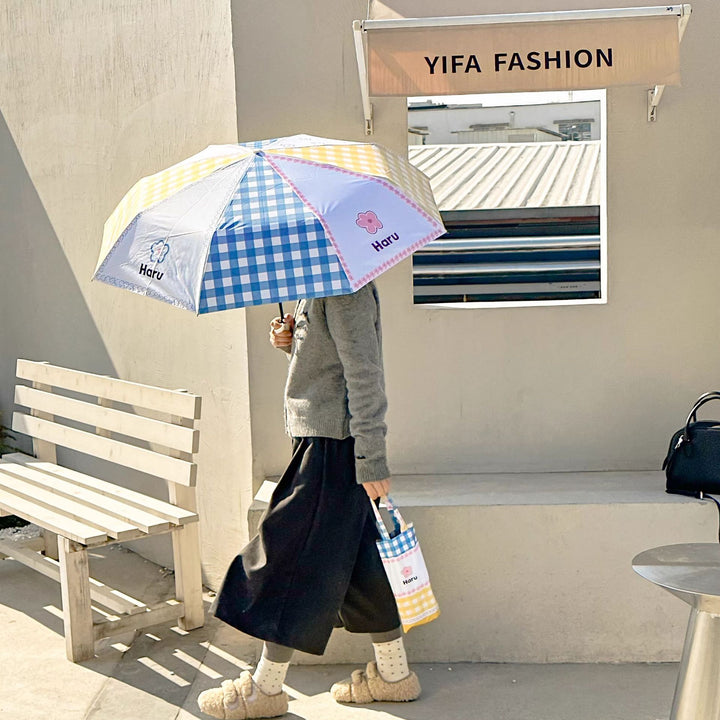 Ladies collapsible umbrella with playful floral pattern Bowlift