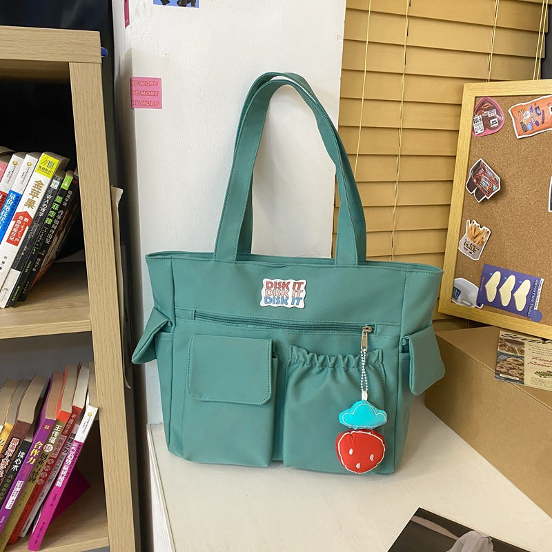 Tote bag with versatile compartments and ergonomic design Bowlift