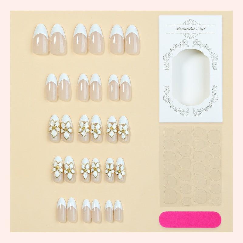Artificial nail set with elegant flowers and glitter decorations Bowlift