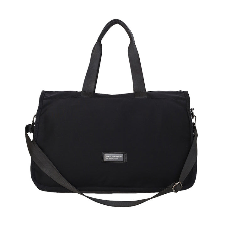 Sporty travel bag with ergonomic carrying handles and versatile compartments Bowlift