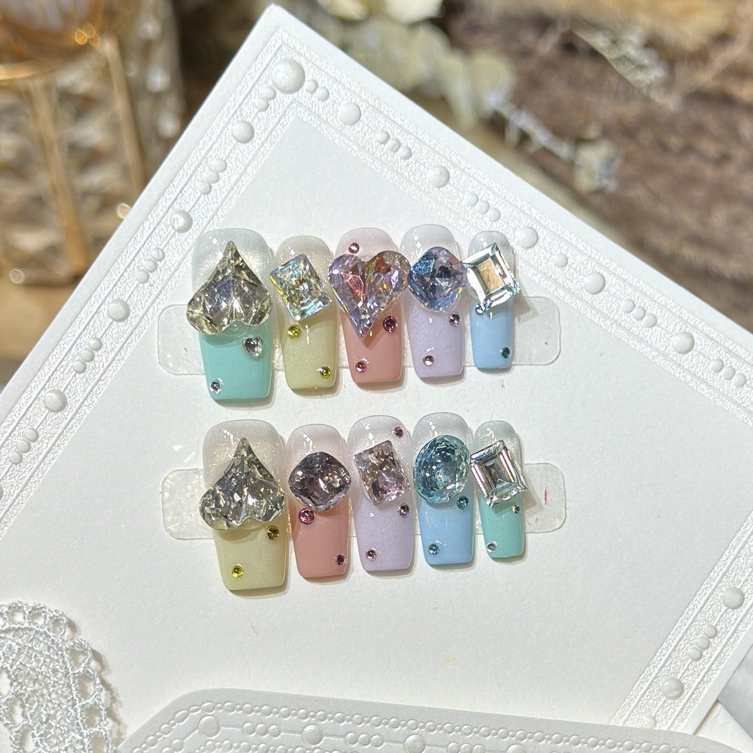 Artistic Press-On Nail Set with Gemstone Embellishments Bowlift