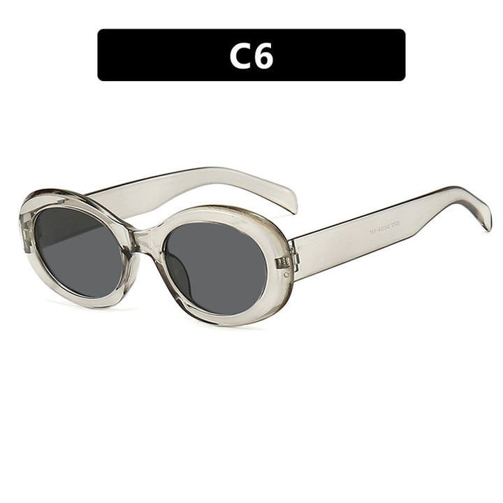 Women's fashionable sunglasses in original oval design with transparent frame and UV protection Bowlift