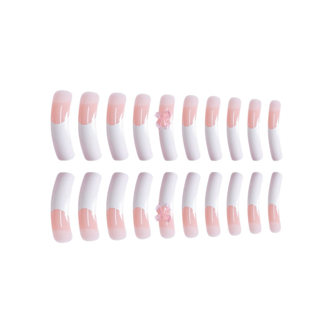 Elegant French Tip Press-On Nails with Bow Accents Bowlift