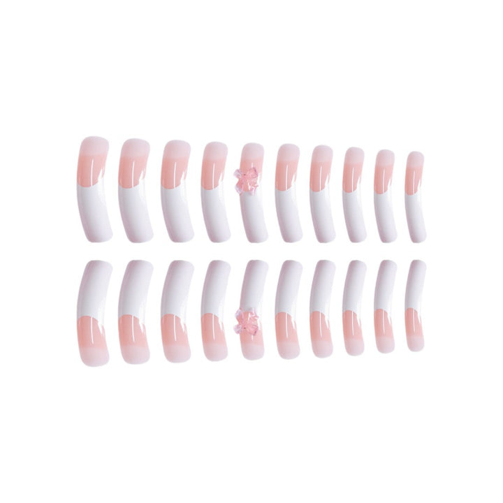 Elegant French Tip Press-On Nails with Bow Accents Bowlift